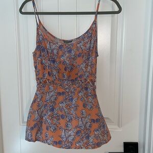 Charlotte Russe tank with peek a book mid section size medium